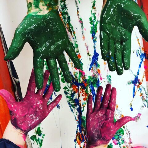 wet paint on hands